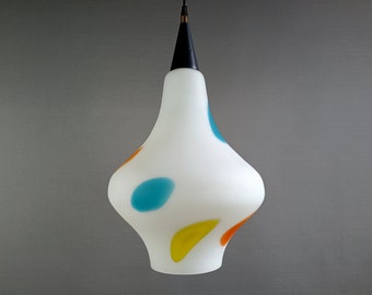 Large one-light 1950s Stilnovo style white cased Murano glass with colorful inclusions pendant lamp.