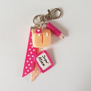 portes-clés super atsem cadeau maitresse ,prof,instit cartable peche et crayon rose