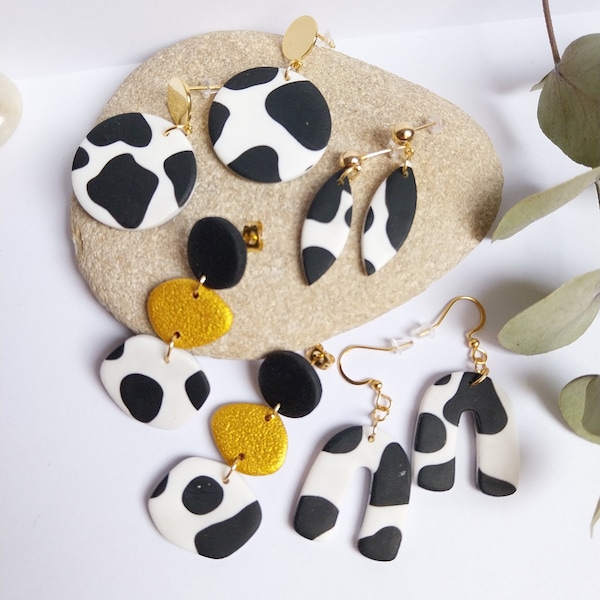 Boucles d'oreilles imprimé de vache, impression de vache,statement earrings, u shape,cow print,acier inoxydable,noir et blanc,modernes