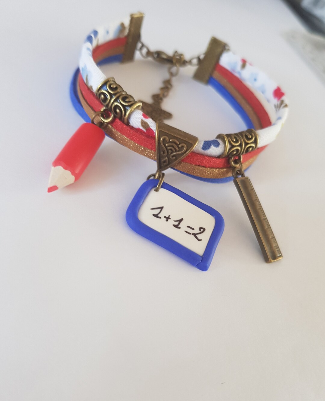 Regalo di fine anno scolastico, braccialetto insegnante, regalo insegnante, regalo scolastico, bronzo, libertà, matita blu, cartella, righello, atsem, braccialetto scolastico, - Italia