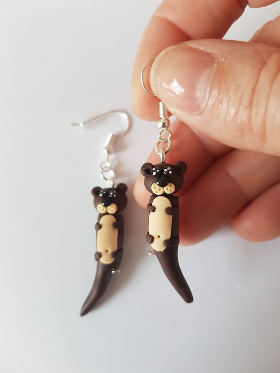 Otter earrings shop
