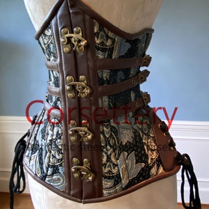 Steel boned underbust steampunk corset from brocade with real leather with steampunk hooks. Real waist training corset for tight lacing.