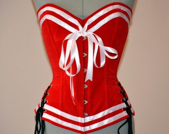 Pinup authentic red corset with bows and laces on hips. Steel-boned corset for tight lacing. Prom, burlesque, cosplay, cute red corset.