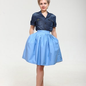 Ah, so cotton! Exclusive full shaped skirt till knees with pockets from thin cotton of blue, white, black or sand colors. Classy new look