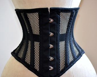 Corset sous-vêtement avec baleines en résille transparente et coton. Véritable corset d'entraînement à la taille pour un laçage serré.