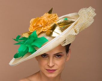 Rebecca- Beige sinamay hatinator with golden yellow silk flower leaves and shiny golden leaves. large hat fascinator for kentucky derby