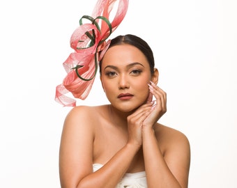 Elegant pink fascinator for events like derby race kentucky. spring race carnival. oaks day pink fascinator. women's pink derby hat show