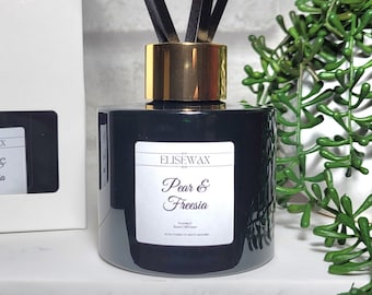 Pear and Freesia scented reed diffuser Emerald glass home fragrance decor Black reeds