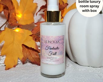 May include: A 100ml glass bottle of room spray with a gold lid and label that says "Elisewax Fantastic Fall Scented Room Spray Made with Pure Essential Oils".
