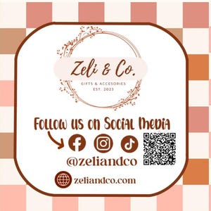 May include: A promotional graphic for Zeli & Co., featuring a white rounded rectangle with the company's logo and social media handles. The background has a checkered pattern in shades of brown and pink. The text includes "Gifts & Accessories" and "Est. 2023".