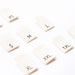 Printed Cotton Size Tabs - Natural Color Clothing Labels with Black Letters - Center Fold - 0.5" (W) x 0.75" (H) Folded Size