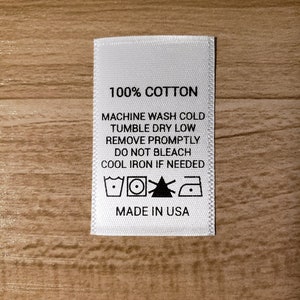 Printed Satin Care Clothing Labels- "100% Cotton" w/ Care Instructions- 1" (W) x 1.5" (H) -White w/ Black Text -Straight Cut Labels -100 PCS