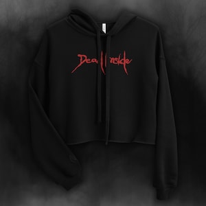 May include: Black cropped hoodie with a red "Dead Inside" graphic printed on the front.