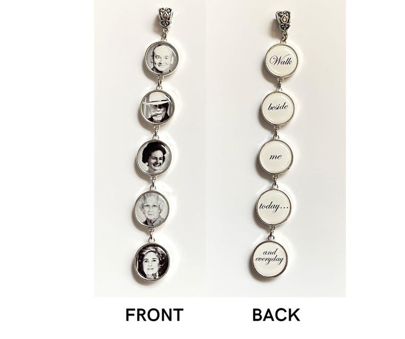May include: A vertical silver-toned pendant featuring five circular frames. The front displays five distinct black and white portrait photographs. The back displays the text Walk, beside, me, today, and everyday in a black cursive font on white.