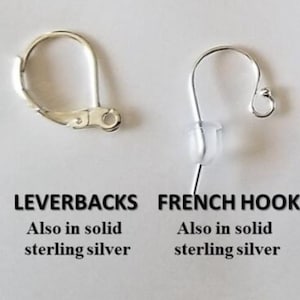 May include: Image of two earring findings: a leverback and a French hook. The leverback is a hinged, silver-coloured clasp. The French hook is a curved wire with a clear plastic stopper. Text reads "LEVERBACKS" and "FRENCH HOOKS", and "Also in solid sterling silver."