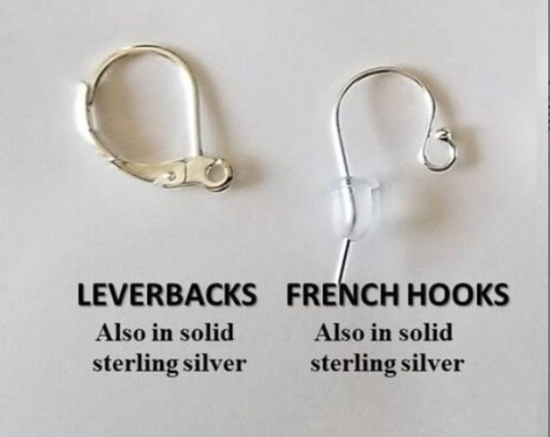 May include: Image of two earring findings: a leverback and a French hook. The leverback is a hinged, silver-coloured clasp. The French hook is a curved wire with a clear plastic stopper. Text reads "LEVERBACKS" and "FRENCH HOOKS", and "Also in solid sterling silver."