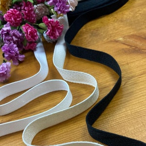 1/4&quot; wide 100% cotton twill tape in white, ivory, or black - perfect for utility ties, drawstrings, lacing and more! By the 3-10 yd length.