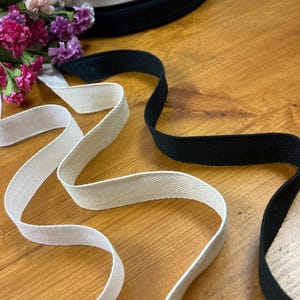 3/4&quot; wide 100% cotton twill tape in white, ivory, or black - perfect for waist stays, binding, hem facing and more! By the 3-10 yd length.