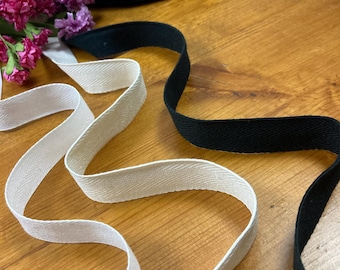 3/4" wide 100% cotton twill tape in white, ivory, or black - perfect for waist stays, binding, hem facing and more! By the 3-10 yd length.