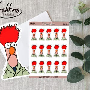 May include: A sheet of planner stickers featuring the character Beaker from The Muppets, with a large sticker of Beaker on the left. The stickers have a red, orange, and green color scheme. The text "Kashkas Fur Mama Made" and "www.xashkas.etsy.com" are visible.