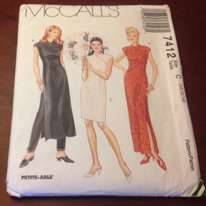 May include: A McCall's 7412 sewing pattern envelope for sizes 10, 12, and 14. The cover features illustrations of three dresses with mandarin collars and side slits, including a black long dress, a white knee-length dress, and a red patterned dress.