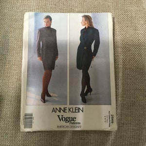 May include: Vogue Patterns sewing pattern for a dress by Anne Klein. The pattern number is 2569 and the sizes are 8, 10, and 12. The pattern shows two different styles of the dress, one with a collar and one without.