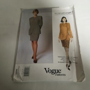 May include: A vintage Vogue sewing pattern for a suit by Emanuel Ungaro. The pattern features two models wearing different styles of suits. The pattern number is 1996 and the size is 14-16-18.