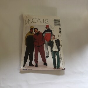 May include: A sewing pattern for a jacket and pants set. The pattern is for sizes extra large and includes instructions for making the garment. The pattern is from McCall's and is for Polarfleece fabric.