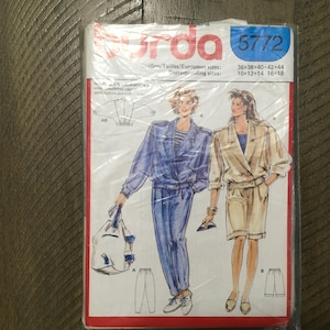 May include: A sewing pattern for a jacket and pants. The pattern is for sizes 36-44 and 10-18. The pattern is from Burda and the pattern number is 5772.