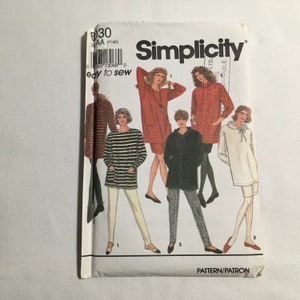 May include: Simplicity sewing pattern number 8030 for easy to sew tops and dresses. The pattern includes four different styles: a striped tunic, a red tunic, a black hooded tunic, and a white hooded tunic. The pattern is for sizes 8-18.