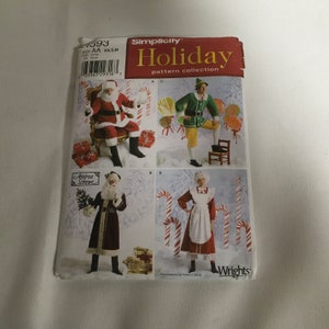 May include: Simplicity Holiday pattern collection sewing pattern for making four different holiday costumes: Santa Claus, Elf, Mrs. Claus, and a black and white Santa Claus. The pattern is for sizes XS, S, and M.