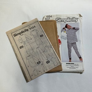 May include: Simplicity sewing pattern number 9354 for a long-sleeved pyjama top and trousers. The pattern includes three variations, with a black and white animal print design shown on the front of the pattern envelope.