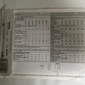 May include: Sewing pattern for juniors' tops and pants or shorts. The pattern includes instructions for making a gathered top with elastic casing, a top with princess seams, pants with a mock fly and drawstring closure, and shorts with cargo pockets. The pattern is for sizes 9/10 to 13/14.