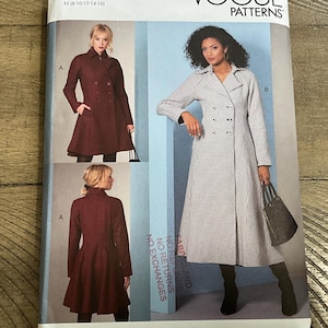 May include: Vogue Patterns V1837 sewing pattern envelope for sizes 8-10-12-14-16. The front displays illustrations of a double-breasted coat in two variations: a solid dark red version and a black and white checkered version, both with collars.