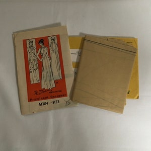 May include: Vintage sewing pattern for a dress, featuring a printed pattern and instructions. The pattern is labelled "Prominent Designer" and "M304 - SIZE 161".
