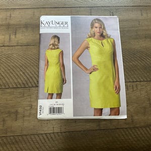 May include: A sewing pattern for a sleeveless dress with a keyhole neckline. The pattern is for sizes 14-16-18-20-22 and is by Kay Unger New York. The pattern is on a white background with a yellow dress on the front.