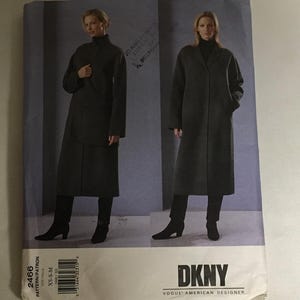 May include: A sewing pattern for a long coat and a skirt. The pattern is for sizes XS, S, and M. The pattern is by DKNY, Vogue American Designer.