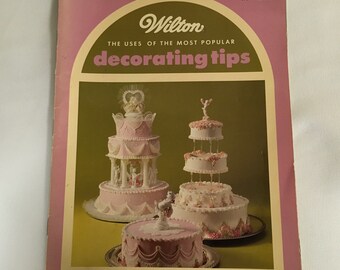 Wilton Hoe het gebruik van de meest populaire decoratietips te boeken Bruidstaarten Drop Flower Tips Bladtips Bloemblaadjes Tips Lint Tips 49 Pagina's
