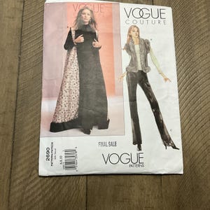 May include: Vogue Couture sewing pattern number 2690. The pattern includes instructions for making a long black vest with a floral print overlay and a pair of black trousers. The pattern is for final sale.