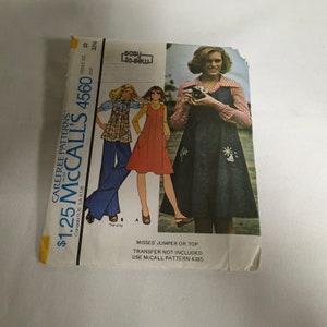 May include: Vintage McCall's sewing pattern for misses' jumper or top, size 10, bust 32 1/2 inches. The pattern features illustrations of the finished garments, including a denim jumper with floral embroidery and a top with flared pants.