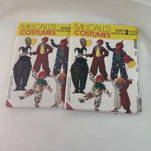 May include: McCall's Easy Costumes sewing pattern 8869 for a clown costume. The pattern includes instructions for making a small size clown costume with a hat. The pattern is illustrated with images of a clown in different poses.
