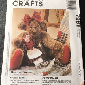May include: A sewing pattern for a teddy bear and a doll. The pattern is called "Gracie Bear" and "L'Ours Gracie". The pattern is from McCall's Crafts and is for one envelope. The pattern includes instructions for making a teddy bear and a doll that are 11 1/2 inches and 9 inches tall.