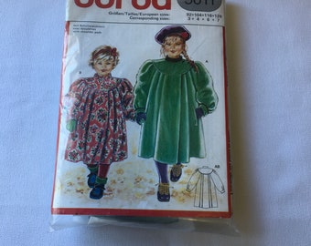 Burda 5611 Sewing Pattern Smocked Coat Dress Coat  Jacket Swing Coat Child Girl  Shoulder Pad Old Fashion Modest Size 3 4 5 6 7