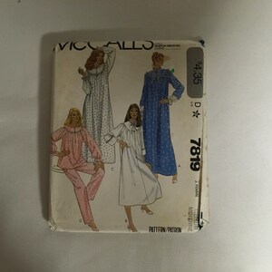 May include: A vintage sewing pattern envelope featuring four women wearing different styles of nightgowns and pajamas. The pattern is for size D, 7819, and is priced at $4.35. The pattern is from the brand Vicallj.