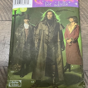 May include: A sewing pattern envelope titled Costumes for adults featuring three individuals in historical-style attire. The left figure wears a top hat and long coat, the center figure a long duster coat, and the right figure a long coat with a wide collar.