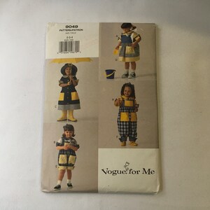 May include: A sewing pattern for children's clothing, Vogue for Me pattern number 9049, size 2-3-4. The pattern includes five different outfits: a dress with a bib, a dress with a matching hat, a pair of overalls, a pair of overalls with a matching hat, and a pair of overalls with a matching shirt.