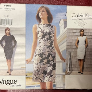 May include: A sewing pattern for a dress by Calvin Klein, Vogue American Designer. The pattern is for sizes 6-8-10 and includes three different styles of dresses. The pattern is printed on white paper with black text and images.