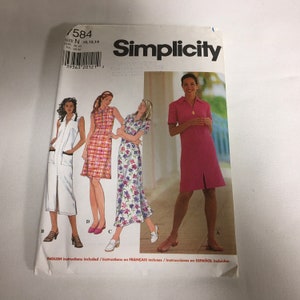 May include: Simplicity sewing pattern number 7584 for sizes 10, 12, and 14. The pattern includes instructions in English, French, and Spanish. The pattern shows three different styles of dresses: a white sleeveless dress with a zipper, a plaid sleeveless dress, and a pink short-sleeved dress.