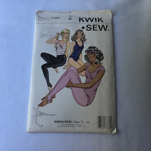 May include: A sewing pattern for a leotard with a striped design. The pattern is from Kwik Sew Pattern Co., Inc. and is for sizes XS-S-M-L.