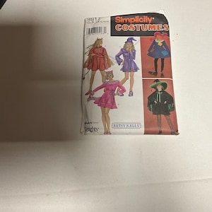 May include: Simplicity Costumes sewing pattern number 9817 for girls' Halloween costumes. The pattern includes four costumes: a devil, a witch, a cat, and a witch with a cape. The pattern is for sizes 4 to 12.